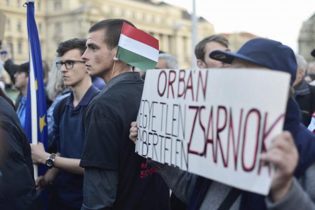 The message 'Orban is a cruel, inhuman tyrant' is displayed during protests against 'anti-Soros law' (Tanjug/AP, file)